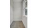 Carpeted walk-in closet with white wire shelving and natural light at 3041 Robeson Trce, Johns Island, SC 29455