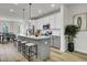Spacious kitchen with stainless steel appliances, a large island, and ample natural light at 422 Caledon Ct, Johns Island, SC 29455