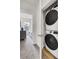 Convenient laundry closet with stacked washer and dryer units for easy laundry access at 422 Caledon Ct, Johns Island, SC 29455