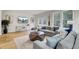 Open-concept living room with stylish decor, comfortable seating, and a view of the outdoors at 422 Caledon Ct, Johns Island, SC 29455