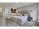Serene primary bedroom with neutral tones, plush carpeting, and decorative mirrors above the nightstands at 422 Caledon Ct, Johns Island, SC 29455