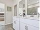 Modern bathroom with double vanity, quartz countertops, and sleek fixtures at 422 Radiant Blue Way, Summerville, SC 29486