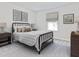 Bright bedroom with neutral decor, dark furniture, and soft carpet at 422 Radiant Blue Way, Summerville, SC 29486