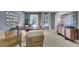 Comfortable home office with ample natural light, and neutral decor creates a productive space at 424 Caledon Ct, Johns Island, SC 29455