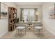 Cozy home office features neutral walls, a desk, and modern shelving at 424 Radiant Blue Way, Summerville, SC 29486