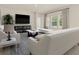 Comfortable living area with stylish furniture, lots of natural light, and open space at 424 Radiant Blue Way, Summerville, SC 29486
