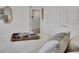 Bright bedroom with a walk-in closet, white walls, and neutral decor at 477 Caledon Ct, Johns Island, SC 29455