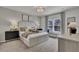 Serene main bedroom with a large window, soft lighting, and comfortable furnishings at 477 Caledon Ct, Johns Island, SC 29455