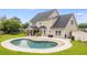 Inviting backyard with a beautiful pool and well-maintained lawn, perfect for outdoor enjoyment at 5289 Mulholland Dr, Summerville, SC 29485