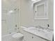 Bright bathroom with a shower/tub combo and a marble countertop vanity at 62 Eastlake Rd, Mount Pleasant, SC 29464