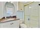 Well-kept bathroom with tiled shower and granite vanity at 62 Eastlake Rd, Mount Pleasant, SC 29464