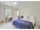 Comfortable bedroom offering a large window and light-colored walls and carpets at 62 Eastlake Rd, Mount Pleasant, SC 29464