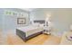 Serene bedroom featuring a cozy bed, bedside tables with lamps, and soft, neutral tones at 62 Eastlake Rd, Mount Pleasant, SC 29464