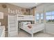 Cozy ' bedroom with bunk beds, a large window, and a fun, welcoming decor at 722 Meadowbrook Ln, Summerville, SC 29486