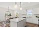 Modern eat-in kitchen with a central island, stainless steel appliances, and plenty of natural light at 722 Meadowbrook Ln, Summerville, SC 29486