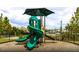 Community playground with a green slide and canopy offering hours of outdoor fun for  at 722 Meadowbrook Ln, Summerville, SC 29486