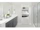 Stylish bathroom featuring dual sinks, a large mirror, and a view into the bedroom at 724 Meadowbrook Ln, Summerville, SC 29486