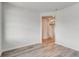 Bright living room showcasing wood floors, neutral paint and seamless flow into other living spaces at 724 Meadowbrook Ln, Summerville, SC 29486