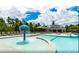 Resort-style community pool featuring a splash pad, ample seating, and a covered pavilion for relaxation at 778 Meadowbrook Ln, Summerville, SC 29486