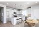 Bright, modern kitchen with white cabinetry, stainless steel appliances, and granite countertops at 778 Meadowbrook Ln, Summerville, SC 29486