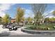 Inviting community green space with picnic tables, landscaping, and nearby retail shops at 782 Meadowbrook Ln, Summerville, SC 29486