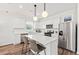 Modern kitchen featuring an island with seating, stainless steel appliances, and sleek cabinetry at 782 Meadowbrook Ln, Summerville, SC 29486