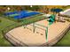 Fenced recreation area with basketball court, playground, and swings at 782 Meadowbrook Ln, Summerville, SC 29486