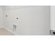 A white walk-in closet with wall fixtures and flooring at 823 Alma Square Dr, Moncks Corner, SC 29461
