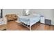 Spacious bedroom with hardwood floors and comfortable lounge seating at 8612 Hickory Creek Ln, North Charleston, SC 29420