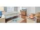Cozy bedroom featuring hardwood floors, a bed, and comfortable furnishings at 8612 Hickory Creek Ln, North Charleston, SC 29420