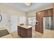 Kitchen with a center island, stainless appliances, and lots of cabinet storage space at 8612 Hickory Creek Ln, North Charleston, SC 29420