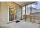 Screened porch area showcasing sliding glass door and view of backyard at 8612 Hickory Creek Ln, North Charleston, SC 29420