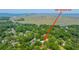 Enjoy a private and relaxing atmosphere in this aerial view of 881 Evans Rd, close to the coast at 881 Evans Rd, Charleston, SC 29412