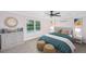 Comfortable bedroom with stylish decor, accent wall, and natural light at 881 Evans Rd, Charleston, SC 29412