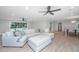 Spacious living area features a large sectional sofa, hardwood floors and modern ceiling fans at 881 Evans Rd, Charleston, SC 29412