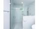 New glass shower with light gray patterned tile and matching gray fixtures at 881 Evans Rd, Charleston, SC 29412