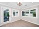 Small, sunlit sitting room featuring white trim and natural light at 881 Evans Rd, Charleston, SC 29412