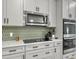 Modern kitchen featuring sleek appliances, stylish backsplash, and ample counter space at 953 Dusk Dr, Summerville, SC 29486
