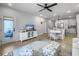 Open-concept living space including kitchen and living room with comfortable furnishings at 953 Dusk Dr, Summerville, SC 29486