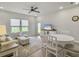 Bright living room featuring a ceiling fan, TV, a comfortable sofa and additional seating at 953 Dusk Dr, Summerville, SC 29486