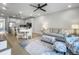 Open-concept living room flows seamlessly into the kitchen, providing an ideal space for entertaining at 953 Dusk Dr, Summerville, SC 29486