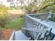 Exterior view of the deck with outdoor seating, offering a relaxing view of the surrounding natural landscape at 1050 Marsh Court Ln, Mount Pleasant, SC 29464