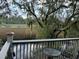 Outdoor deck offers a scenic view of the surrounding marsh landscape at 1050 Marsh Court Ln, Mount Pleasant, SC 29464