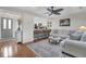 Comfortable living room open to a modern kitchen, featuring stylish furniture and bright lighting at 1050 Marsh Court Ln, Mount Pleasant, SC 29464