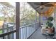Cozy screened porch with comfortable seating and outdoor decor, offering scenic views of the landscape at 1050 Marsh Court Ln, Mount Pleasant, SC 29464
