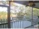 Comfortable screened porch with ceiling fan and inviting seating, perfect for enjoying the natural views at 1050 Marsh Court Ln, Mount Pleasant, SC 29464