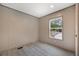 Bedroom with light vinyl flooring and a window allowing natural light to filter through at 106 Swanson Dr, Summerville, SC 29483