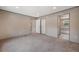 A spacious bedroom with neutral carpet, recessed lighting and multiple closets for ample storage space at 106 Swanson Dr, Summerville, SC 29483