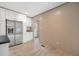 Modern kitchen with stainless steel refrigerator and white cabinets at 106 Swanson Dr, Summerville, SC 29483