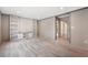 Open living room with built-in shelving and modern, light-colored flooring at 106 Swanson Dr, Summerville, SC 29483